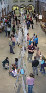 High school students presenting project posters at the University of Washington