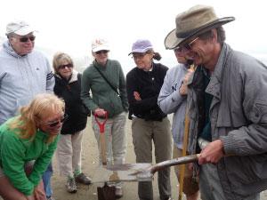 Dr. Stewart Schultz, OIMB, and volunteers in the Coastal Master Naturalist Program explore organisms of the sandy shore